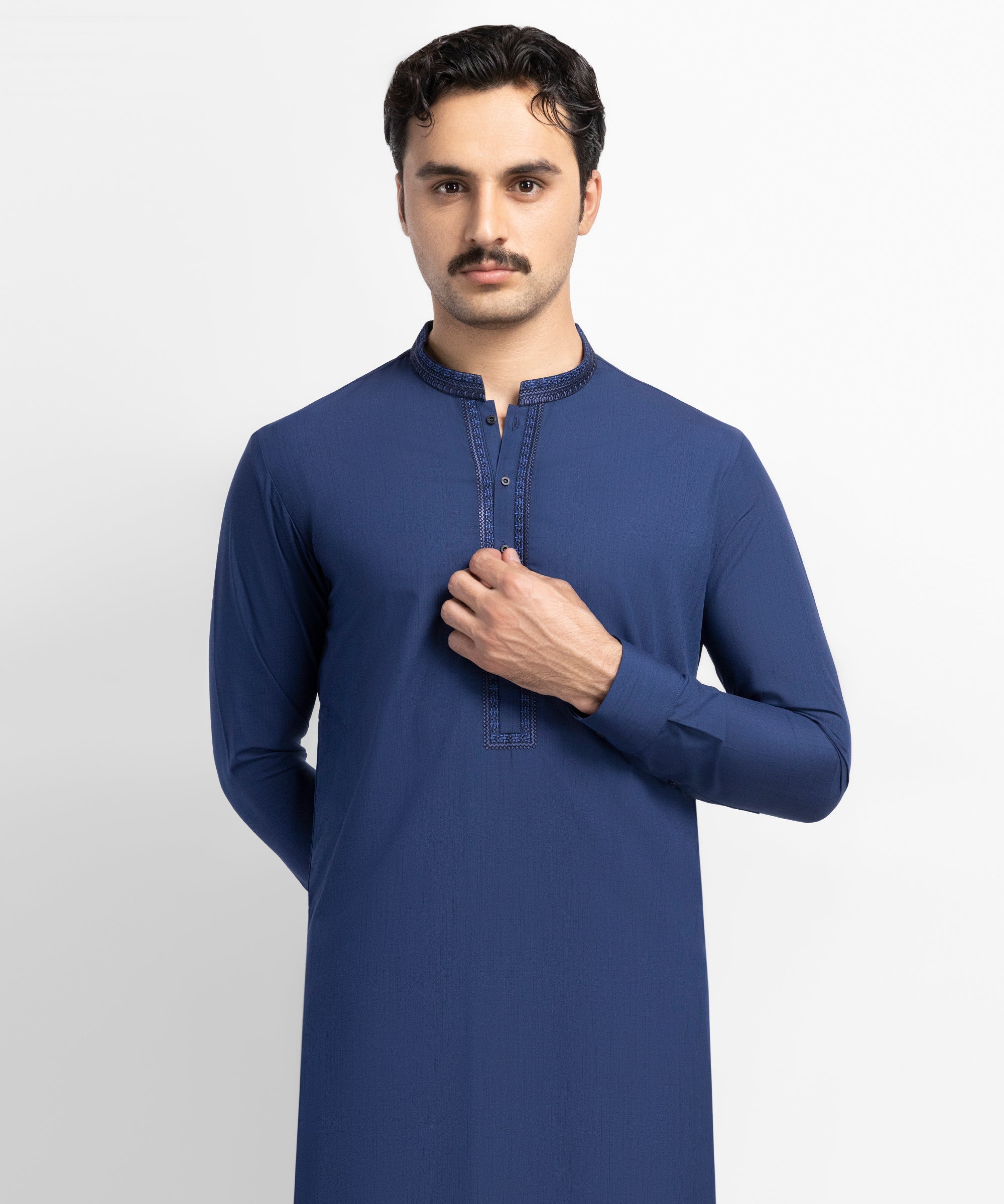 Model in a navy Atif's shalwar kameez