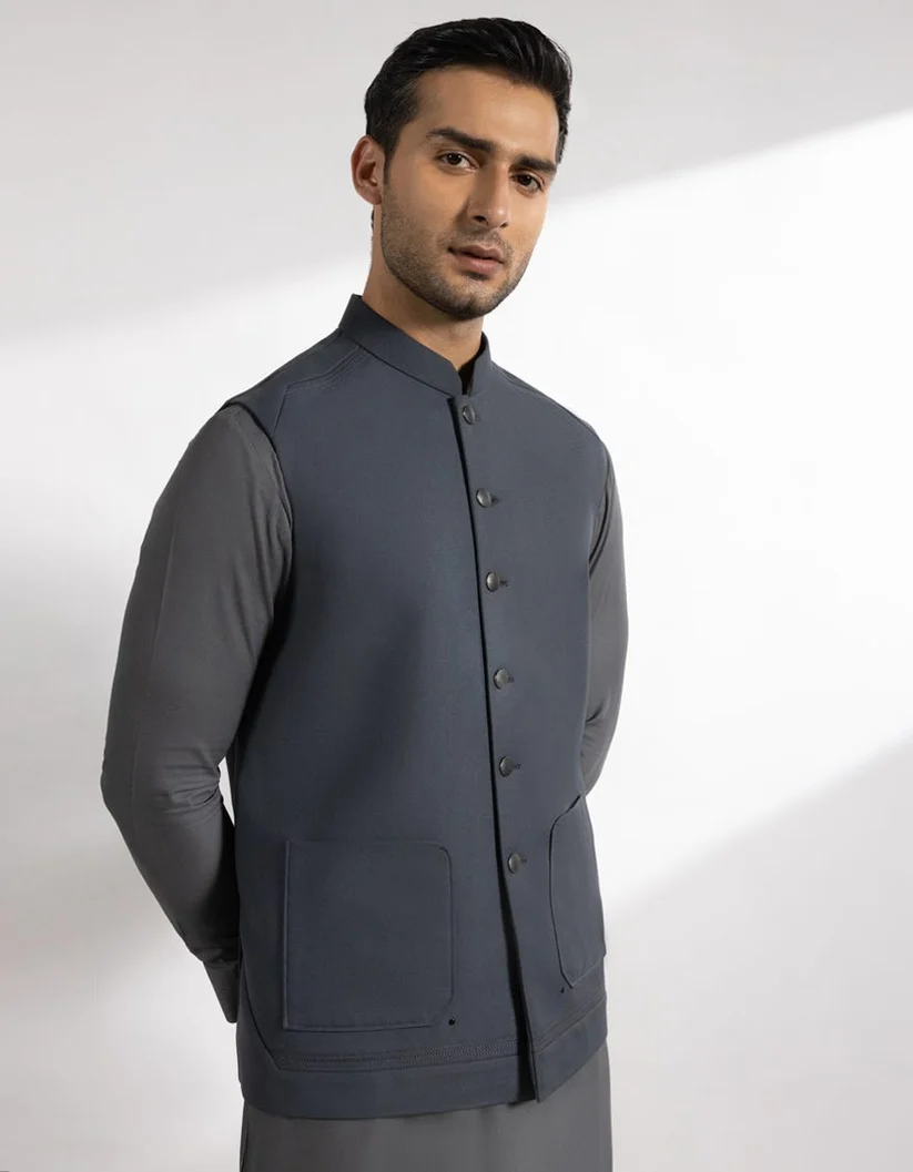Graphite formal waistcoat over a white kameez