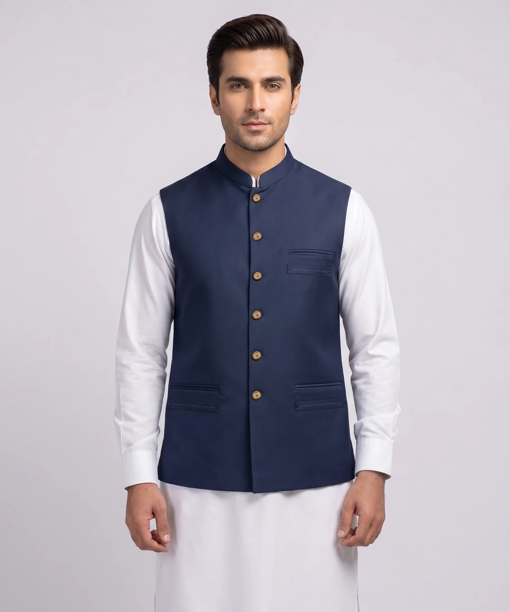 Model in a navy Atif's waistcoat